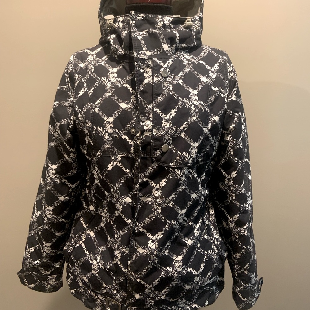 Burton’s snowboarding/ski jacket w/hood. Size :Small. Color:B&W.